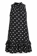A sleeveless black dress with a white polka dot pattern, featuring a high gathered neckline and a tiered ruffle hem, shown against a plain white background.